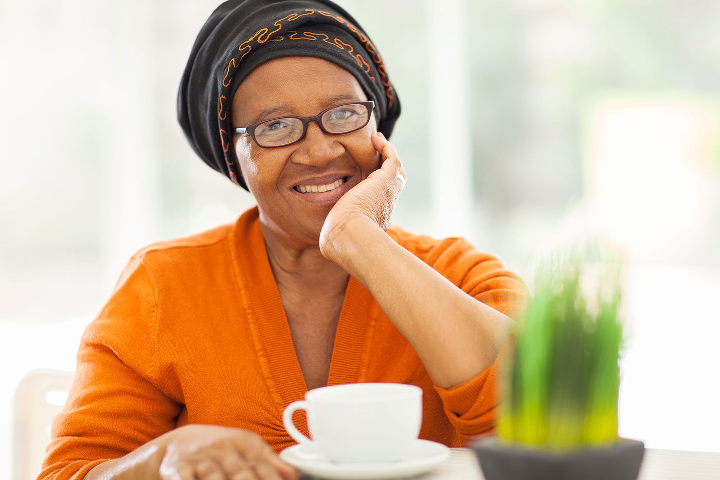 An African woman enjoying a cup of tea